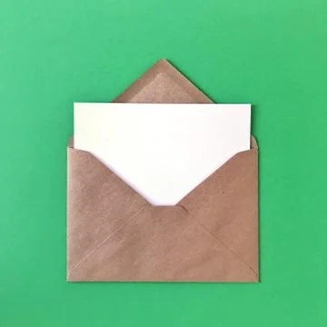 Blank Postcard with Envelope on Green Background Stock Photos
