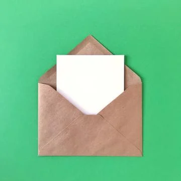 Blank Postcard with Envelope on Green Background Stock Photos