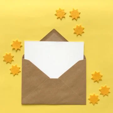 Blank Postcard in Envelope on Yellow Background Stock Photos