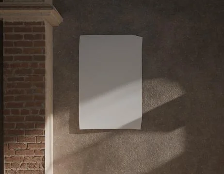 Blank poster on a brick wall. Sunlight casts shadows Stock Photos