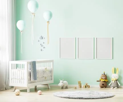 Blank poster frames mock up on green wall in nursery room interior background Illustrazione stock