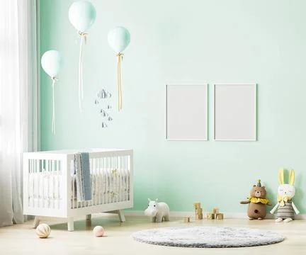 Blank poster frames mock up on green wall in nursery room interior backgro... Foto stock