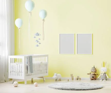 Blank poster frames mock up on yellow wall in nursery room interior backgr... Stock Photos
