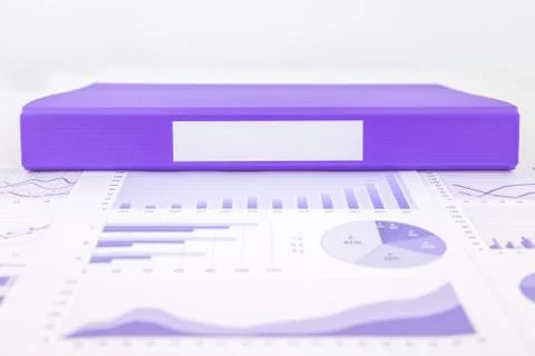 Blank purple folder with graph summary and educational reports Stock Photos