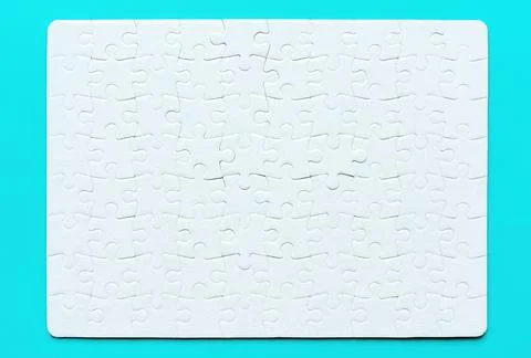 Blank Rectangular Jigsaw Puzzle Isolated on Blue 스톡 사진