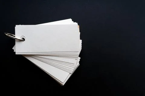 Blank ring memo on black background Stock Photos
