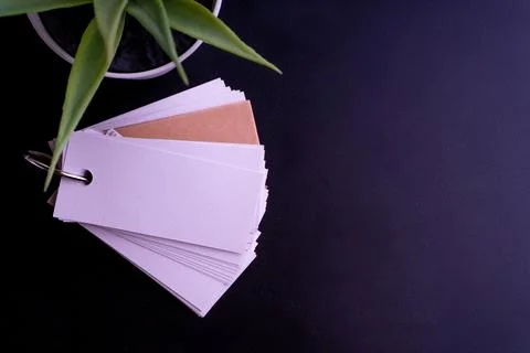 Blank ring memo on black background Stock Photos