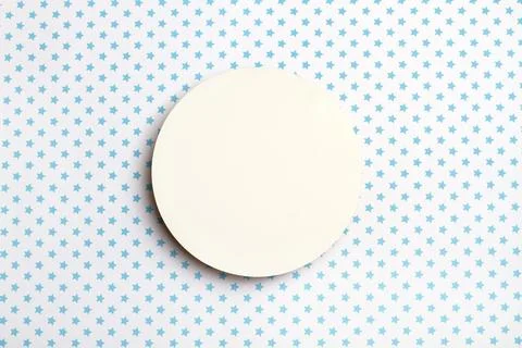 A blank round copy space on a white background with blue stars in a top view Foto stock