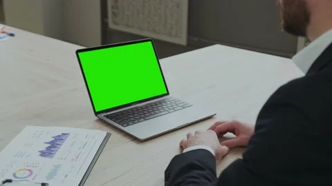 Blank screen with chroma key on laptop, business online conference. Businessman Stock Footage 170792324