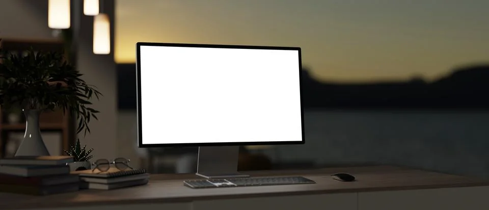 Blank screen computer with book and houseplant on wooden table in dim lit r.. Stock Illustration