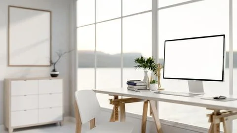 Blank screen computer with books and wooden figure aside on marble table in.. Illustrazione stock