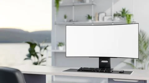 Blank screen computer on wooden table in a bright white room with green pot.. Illustrazione stock