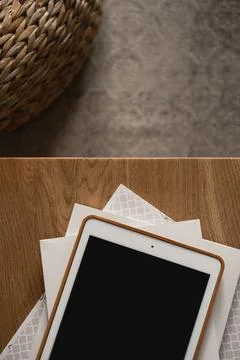 Blank screen display on wooden table. Flat lay, top view minimalist blog, web Stock Photos