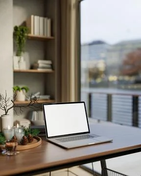 Blank screen laptop and coffee aside wooden tray with candles and pinecone .. Stock Illustration