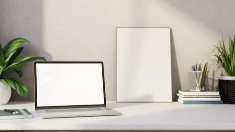Blank screen laptop with book and stationery aside frame canvas on white ta.. Stock Illustration