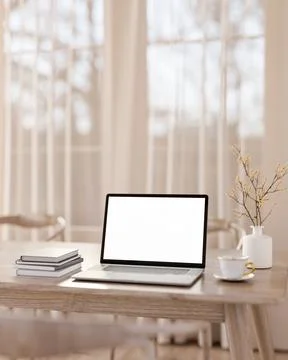 Blank screen laptop with coffee and books aside vase on wooden table across.. 스톡 일러스트