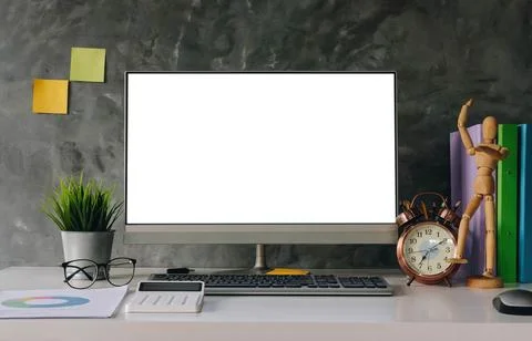Blank screen Laptop computer and poster workspace background in modern office Stock Photos