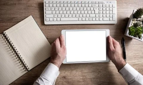 Blank screen tablet at the office Stock Photos