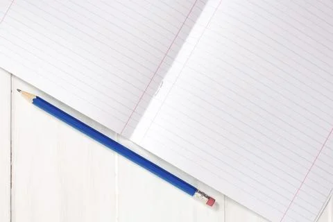 Blank sheet of lined notebook with pencil Stock Photos