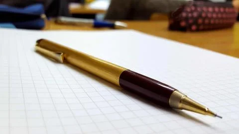 Blank sheet of notebook with pencil. Stock Photos