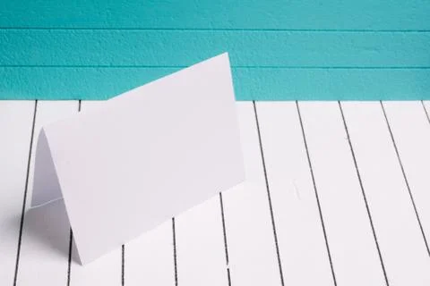 Blank sheet of paper against a background  white wood Stock Photos
