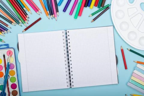 Blank sheet of paper of an open math notebook, art school supplies for painting Stock Photos