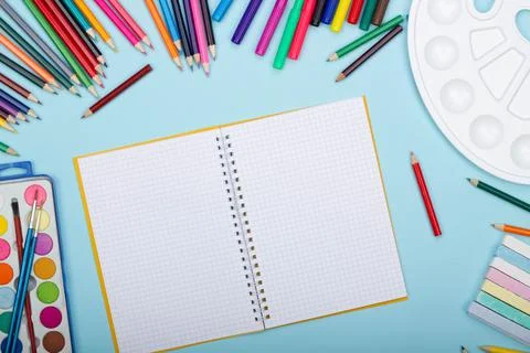 Blank sheet of paper of an open math notebook, art school supplies for painting Stock Photos