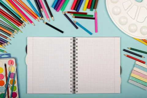 Blank sheet of paper of an open math notebook, art school supplies for painting Stock Photos