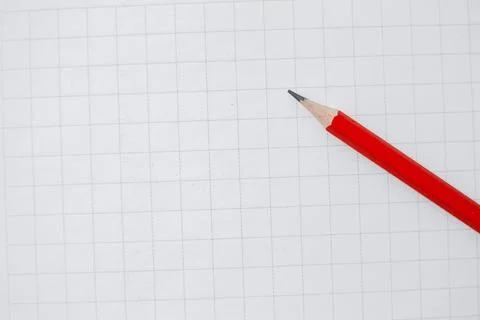Blank sheet of white squared paper with a simple pencil Stock Photos