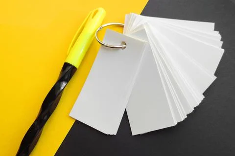 Blank sheets of Notepad are held together with a metal ring , Stock Photos