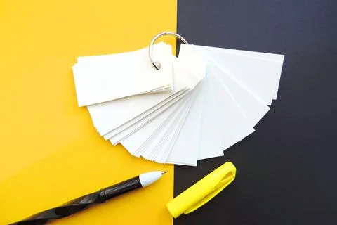 Blank sheets of Notepad are held together with a metal ring , Stock Photos