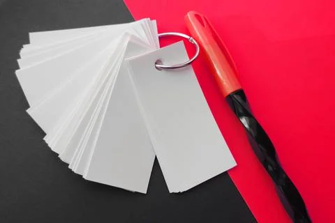 Blank sheets of Notepad are held together with a metal ring , 写真素材