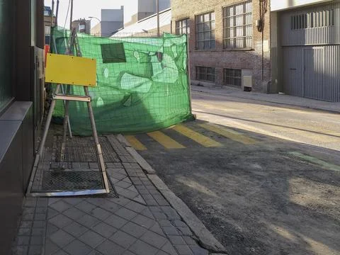 Blank sign next to a work zone in a street Stock Photos
