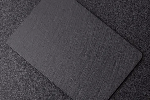 A blank slate board on a dark background for Asian food. A blank slate board Stock Photos