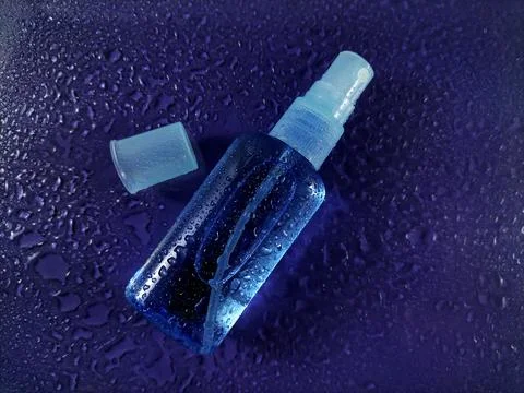 Blank small bottle with spray cap Stock Photos