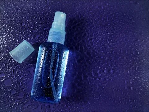 Blank small bottle with spray cap Stock Photos