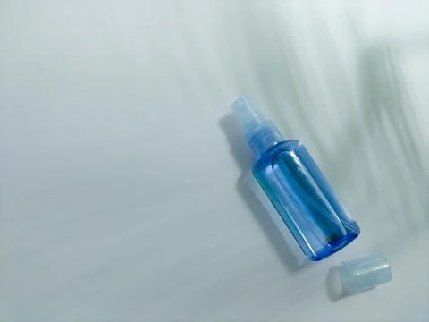 Blank small bottle with spray cap Stock Photos