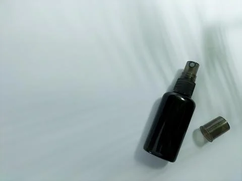 Blank small bottle with spray cap Stock Photos