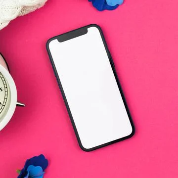 Blank smartphone screen mockup, flat lay design, top view and pink background Stock Photos