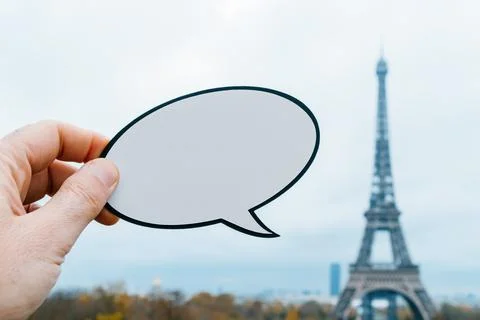 Blank speech balloon at the Eiffel Tower, in Paris Stock Photos