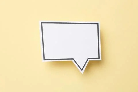 Blank speech bubble on beige background, top view. Space for text Stock Photos
