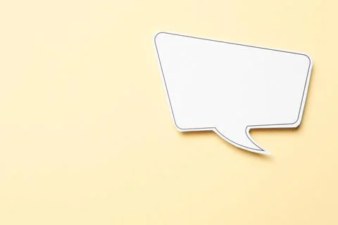 Blank speech bubble on beige background, top view. Space for text Stock Photos