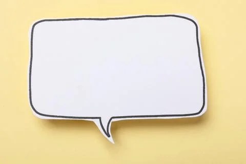 Blank speech bubble on beige background. Space for text Stock Photos