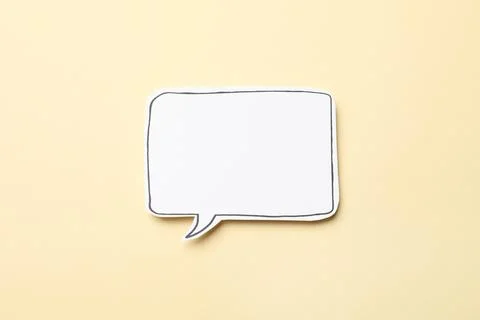 Blank speech bubble on beige background, top view. Space for text Stock Photos