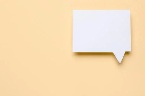 Blank speech bubble on beige background, top view. Space for text Stock Photos