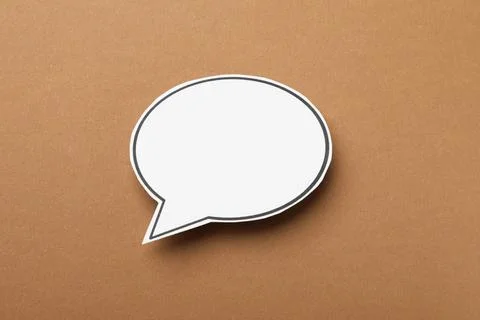 Blank speech bubble on brown background. Space for text Stock Photos