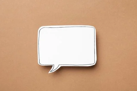 Blank speech bubble on brown background, top view. Space for text Stock Photos