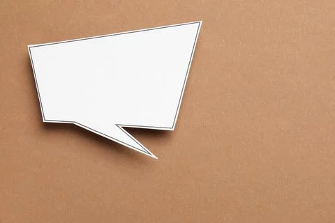 Blank speech bubble on brown background, top view. Space for text Stock Photos