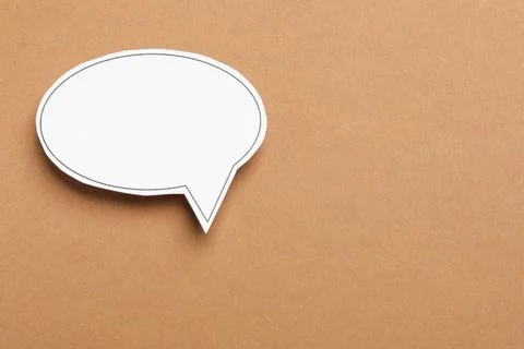 Blank speech bubble on brown background. Space for text Stock Photos
