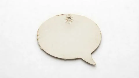 Blank speech bubble cutout with star detail on white background for design .. Stock Photos